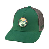 Green hat with patch depicting two people fishing