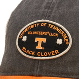 Black and orange two tone vintage style hat from Black Clover featuring University of Tennessee Volunteers logo