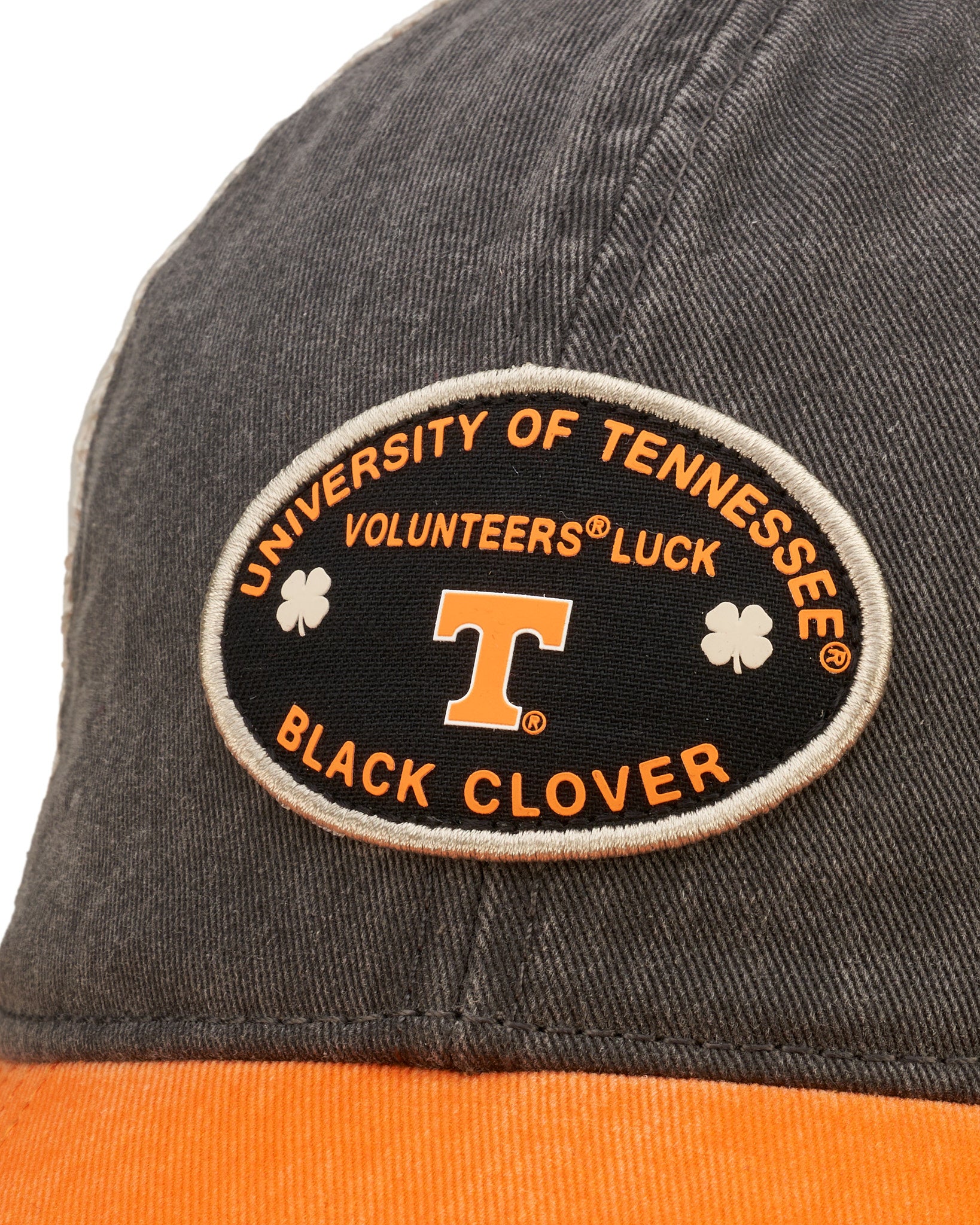 Black and orange two tone vintage style hat from Black Clover featuring University of Tennessee Volunteers logo