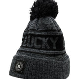 "Lucky Baller" beanie from Black Clover featuring, a black striped design, a cuff, and fluffy black pom-pom on top