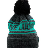 "Lucky Baller" beanie from Black Clover featuring, a ultramarine striped design, a cuff, and fluffy black pom-pom on top