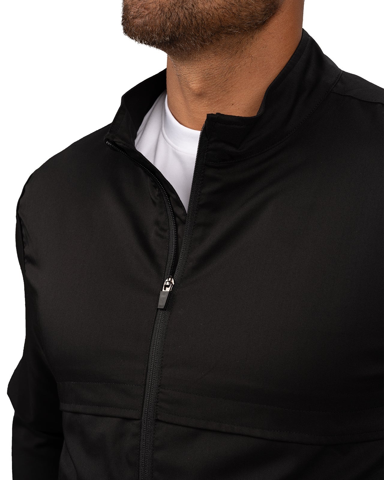 Fashionable black twill jacket with zipper, roomy pockets and wrinkle-free and anti-microbial features