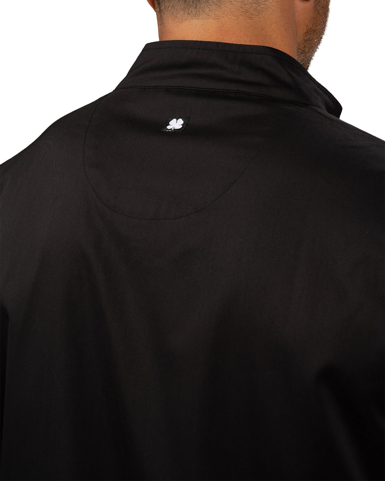 Fashionable black twill jacket with zipper, roomy pockets and wrinkle-free and anti-microbial features