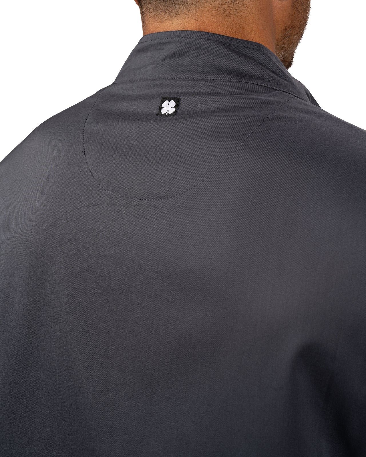 Fashionable grey twill jacket with zipper, roomy pockets and wrinkle-free and anti-microbial features