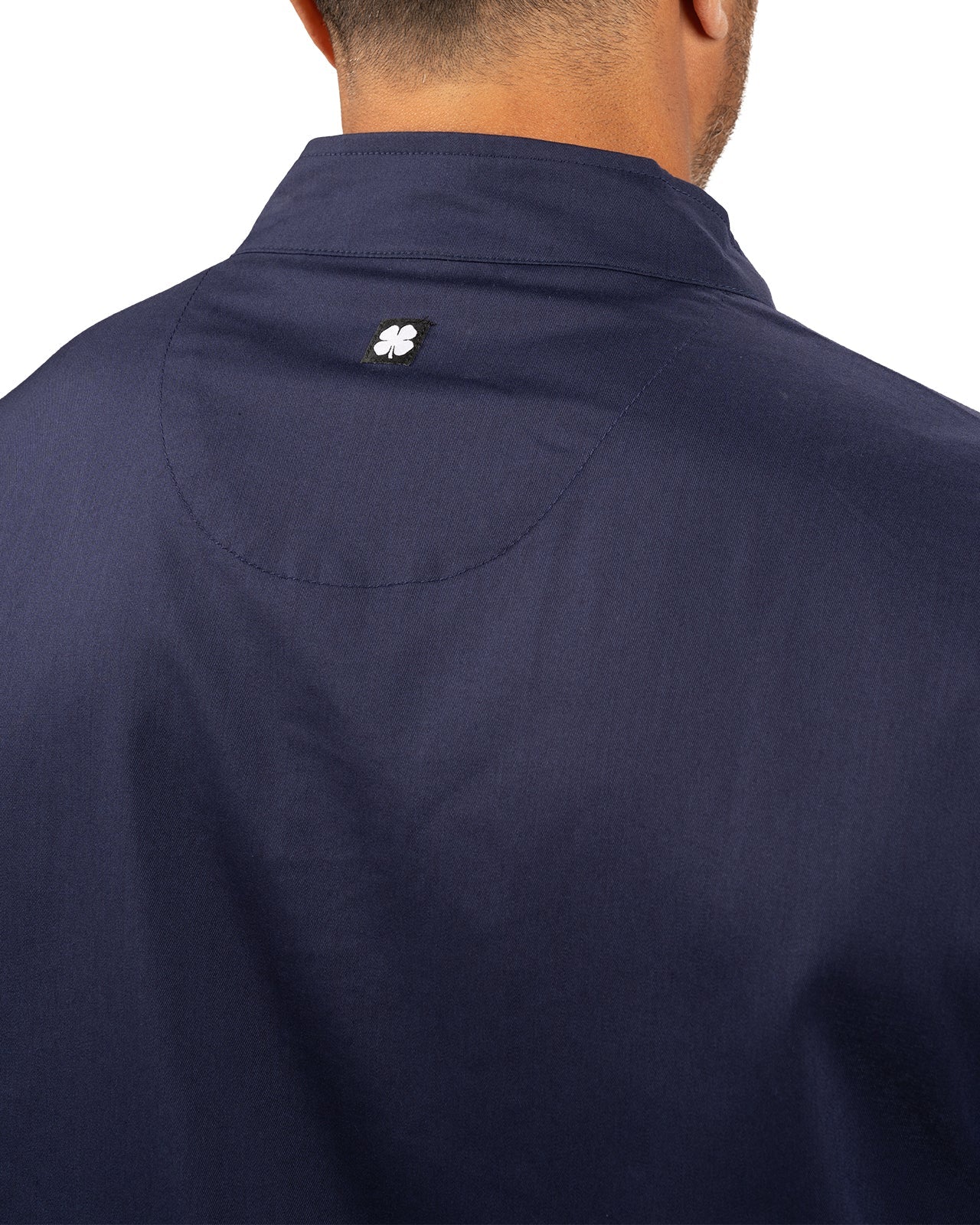 Fashionable navy twill jacket with zipper, roomy pockets and wrinkle-free and anti-microbial features