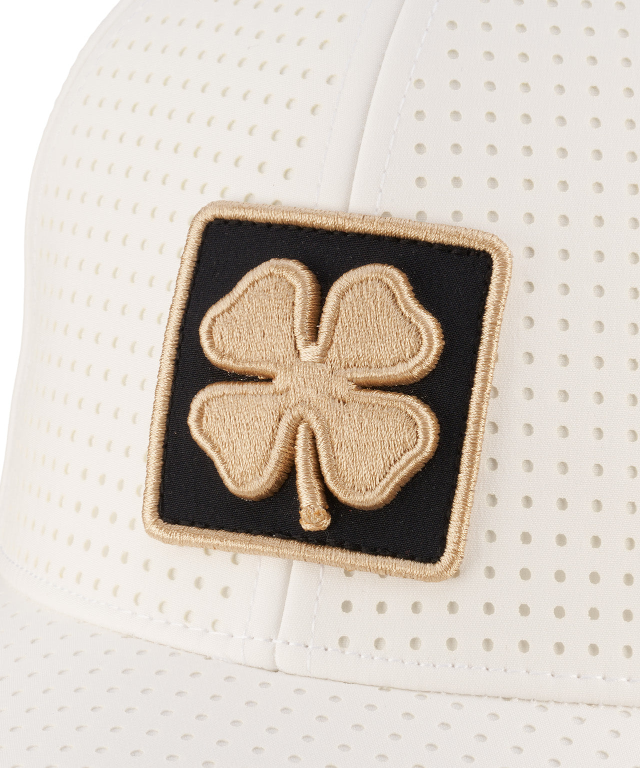 perforated white hat from Black Clover featuring the Colorado University Buffs patch in gold and black