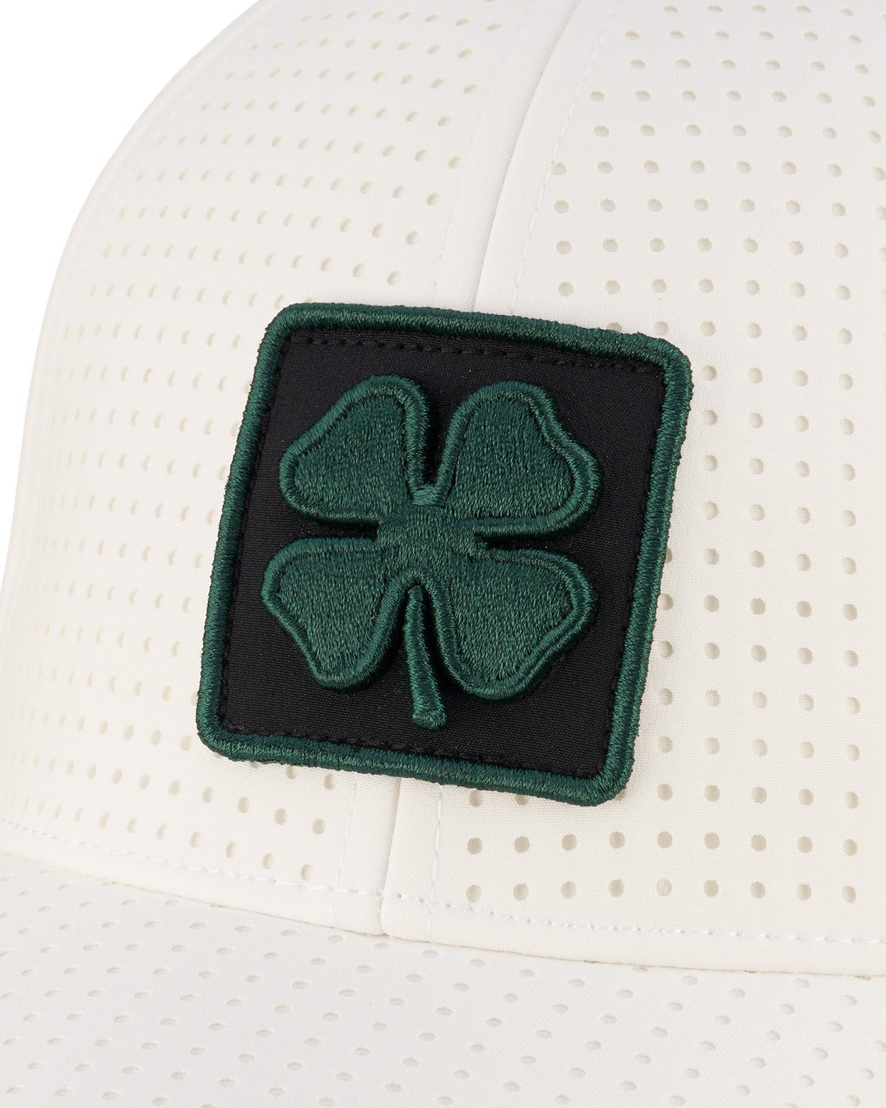 Perforated white hat from Black Clover featuring Colorado State patch in Green