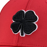 Bold, red hat from Black Clover featuring premium style and craftmanship. It features an embroidered black clover icon, and the words "Live Lucky" on the side.