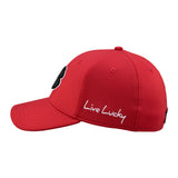 Bold, red hat from Black Clover featuring premium style and craftmanship. It features an embroidered black clover icon, and the words "Live Lucky" on the side.