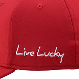 Bold, red hat from Black Clover featuring premium style and craftmanship. It features an embroidered black clover icon, and the words "Live Lucky" on the side.