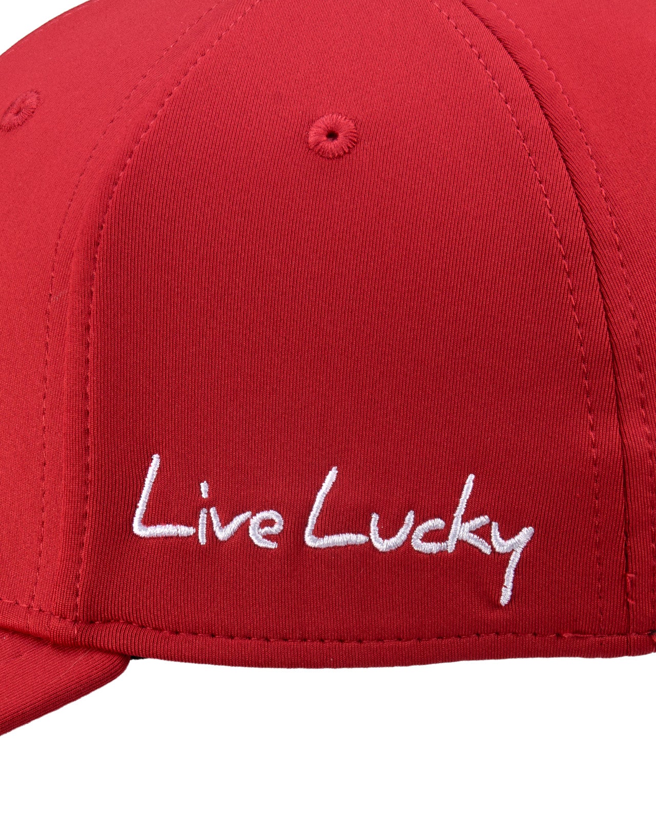 Bold, red hat from Black Clover featuring premium style and craftmanship. It features an embroidered black clover icon, and the words "Live Lucky" on the side.