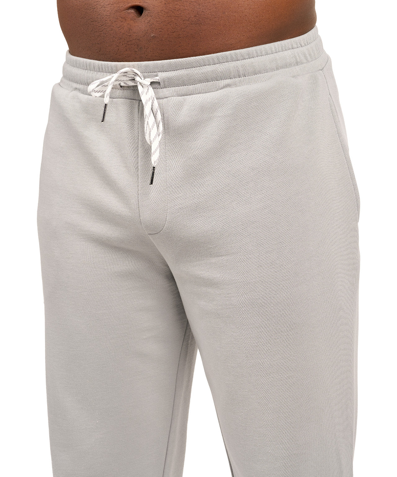 Man wearing light grey sweat pants joggers from black clover