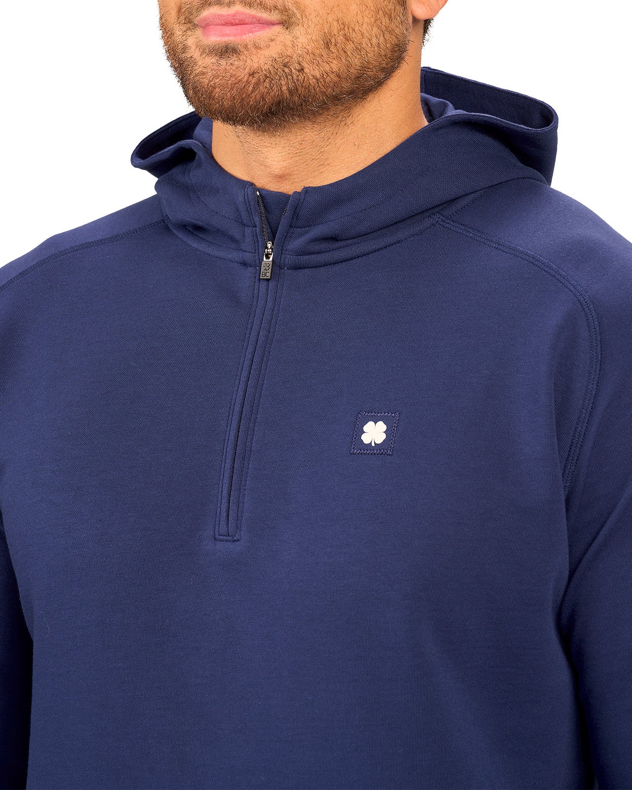 navy hoodie with Black Clover logo on chest