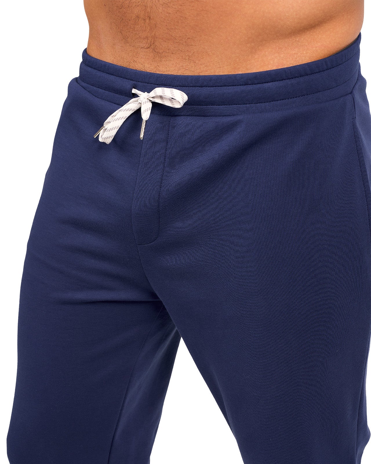 Man wearing navy sweat pants joggers from black clover