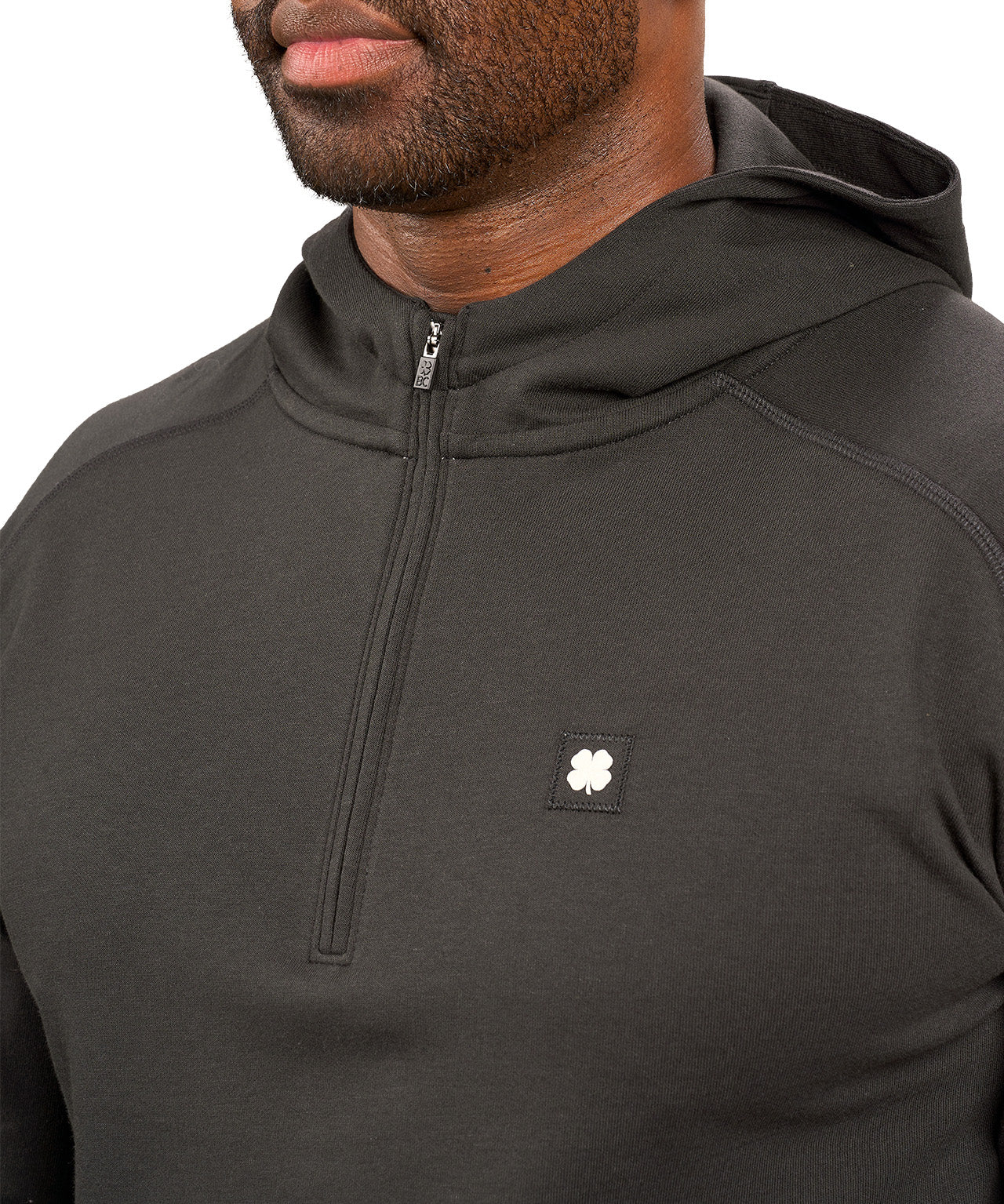 black hoodie with Black Clover logo on chest