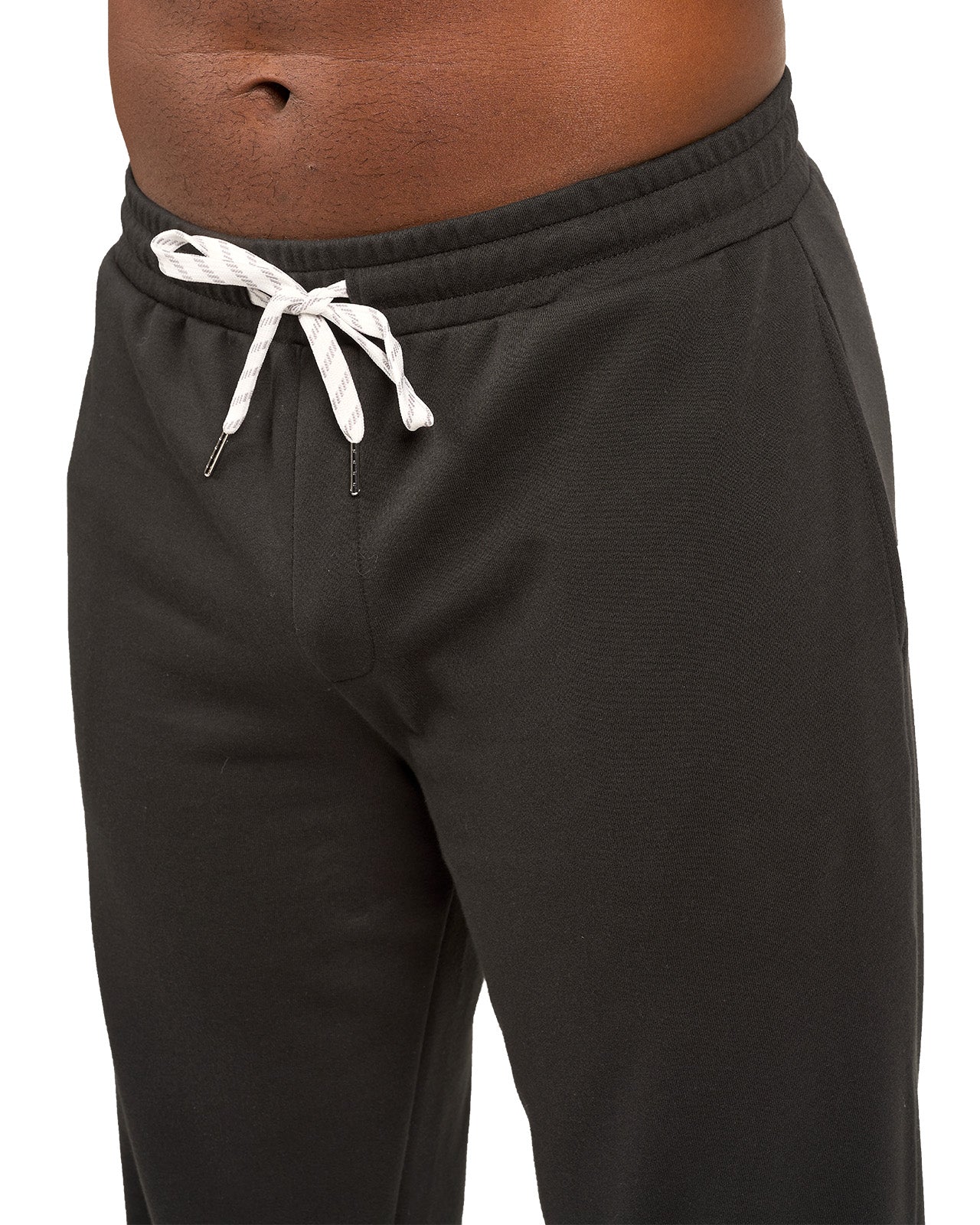 Man wearing black sweat pants joggers from black clover