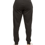 Man wearing black sweat pants joggers from black clover