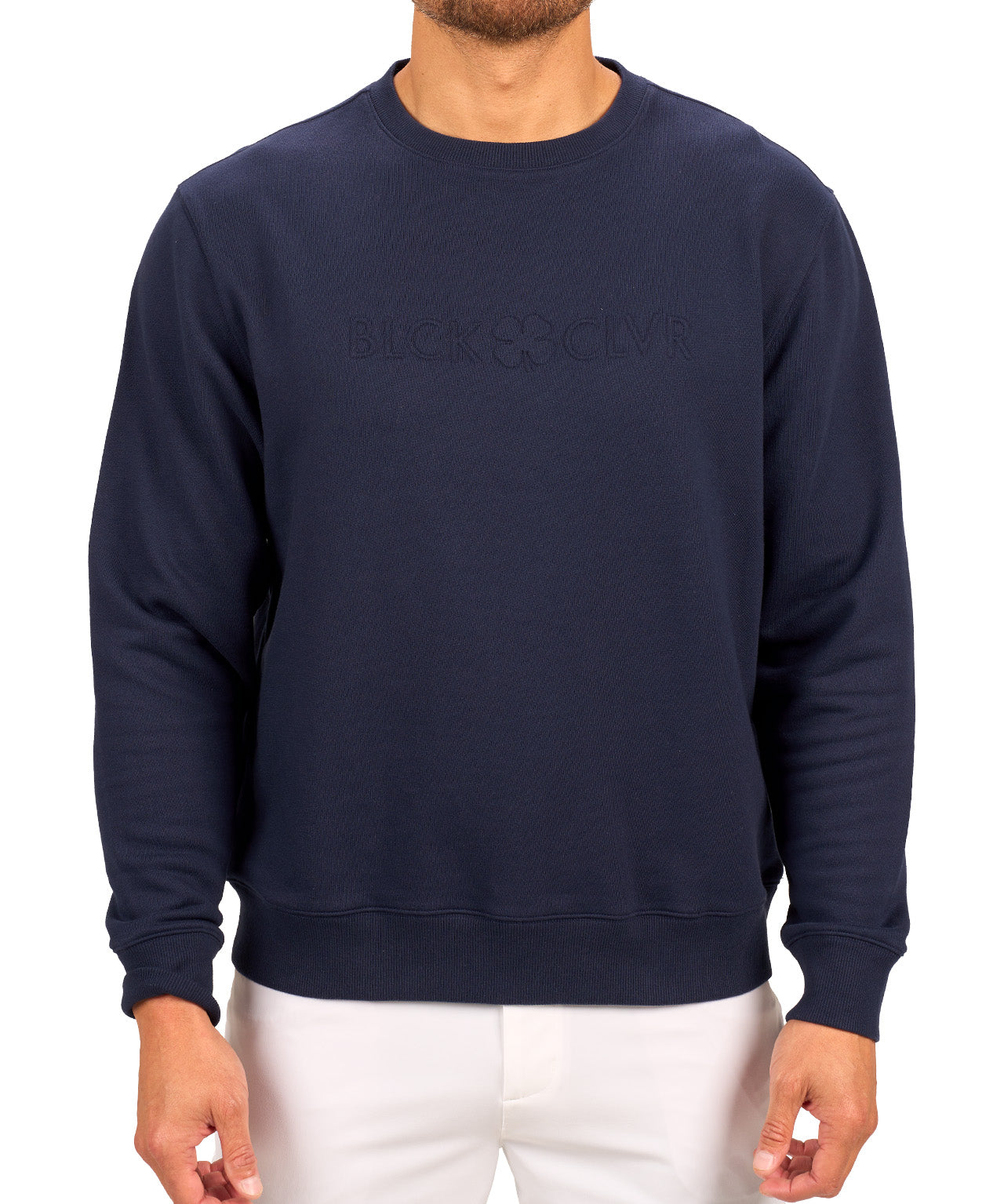 man wearing an navy colored sweater from Black Clover with a 3d text BLCK CLVR on the chest