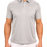 Man wearing a light grey polo from Black Clover with a small BC logo on the left chest