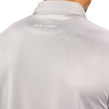 Man wearing a light grey polo from Black Clover with a small BC logo on the left chest