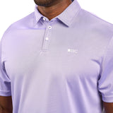 Man wearing a light purple polo from Black Clover with a small BC logo on the left chest