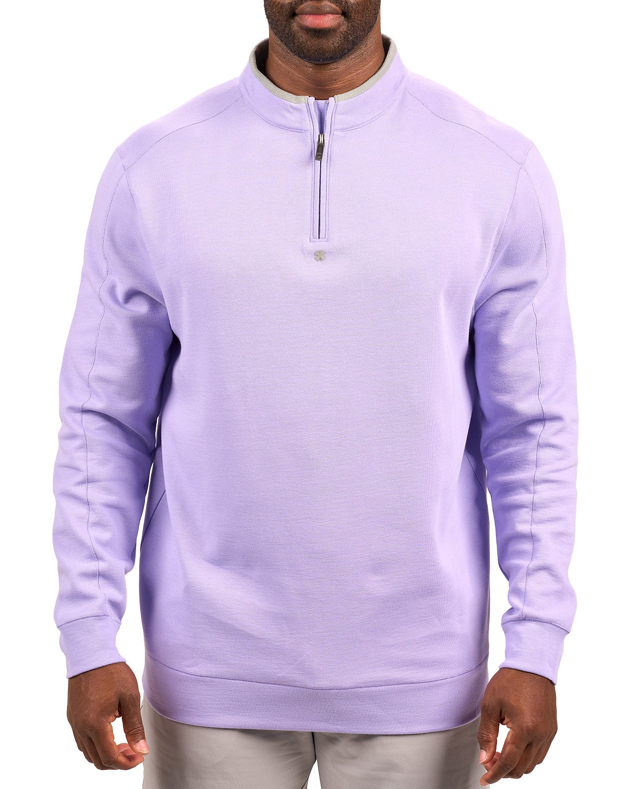 Man wearing a light purple quarter zip sweater from Black Clover featuring a small clover below the zipper