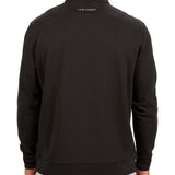 Man wearing a black quarter zip sweater from Black Clover featuring a small clover below the zipper