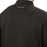 Man wearing a black quarter zip sweater from Black Clover featuring a small clover below the zipper