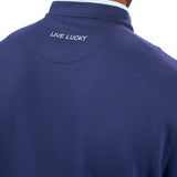 Man wearing a navy quarter zip sweater from Black Clover featuring a small clover below the zipper