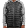 Man wearing black quilted jacket from Black Clover