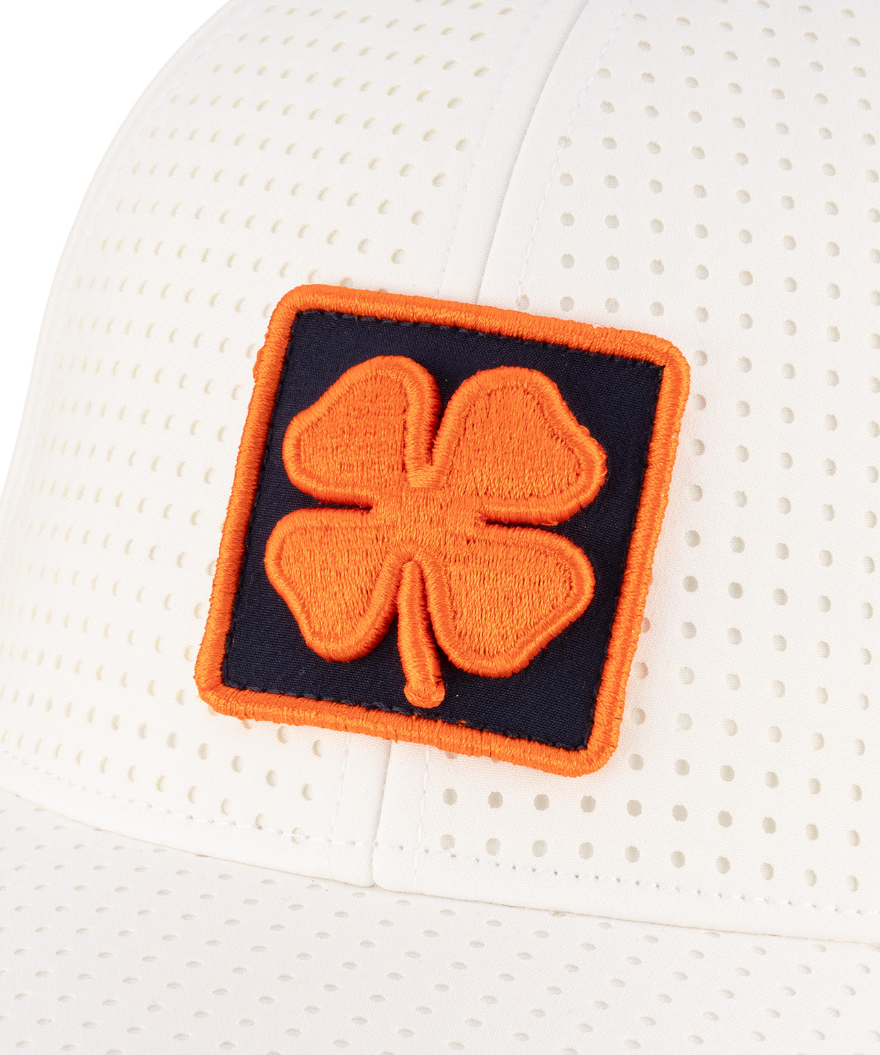 white perforated hat from Black Clover featuring University of Illinois Logo