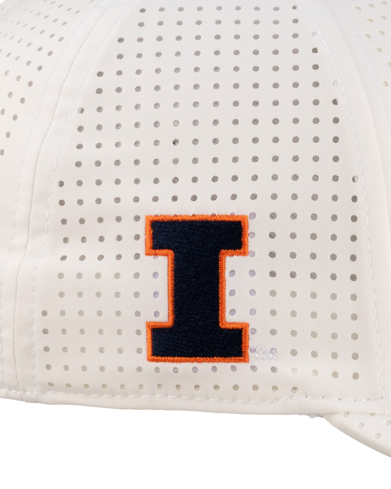 white perforated hat from Black Clover featuring University of Illinois Logo