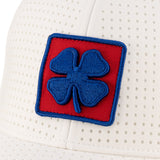 White perforated hat from Black Clover featuring the University of Kansas Jayhawks logo