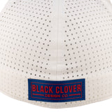 White perforated hat from Black Clover featuring the University of Kansas Jayhawks logo