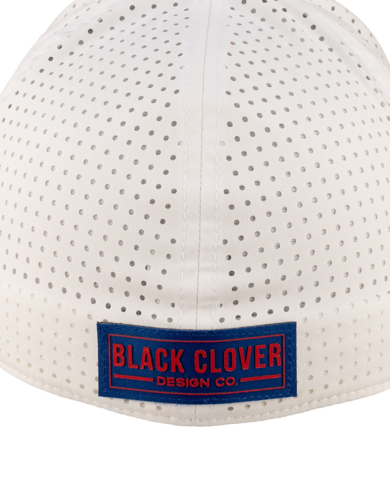 White perforated hat from Black Clover featuring the University of Kansas Jayhawks logo