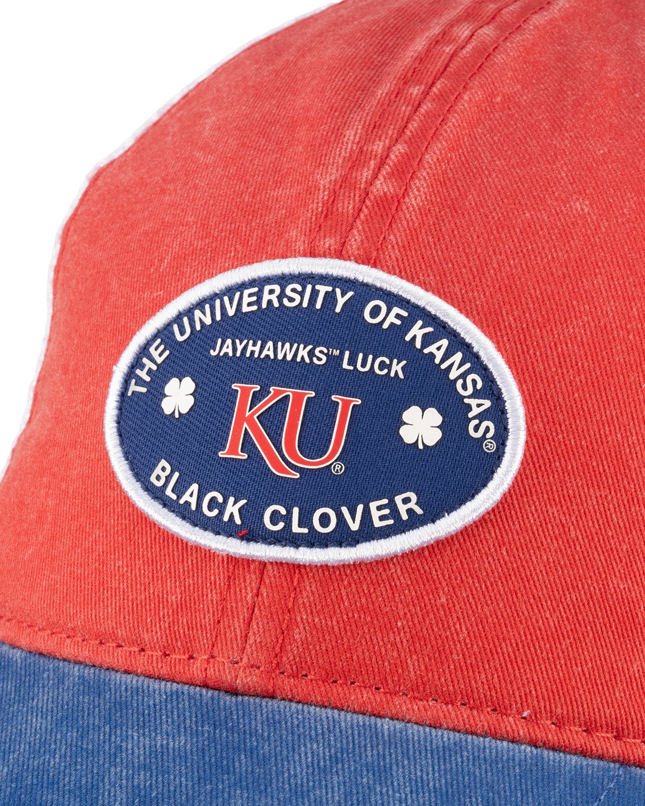 Red and blue two tone vintage style hat from Black Clover featuring the University of Kansas Jayhawks logo