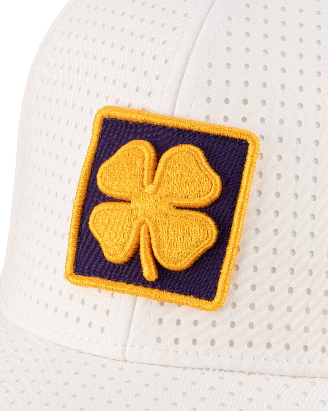 white perforated hat from Black Clover featuring LSU logo