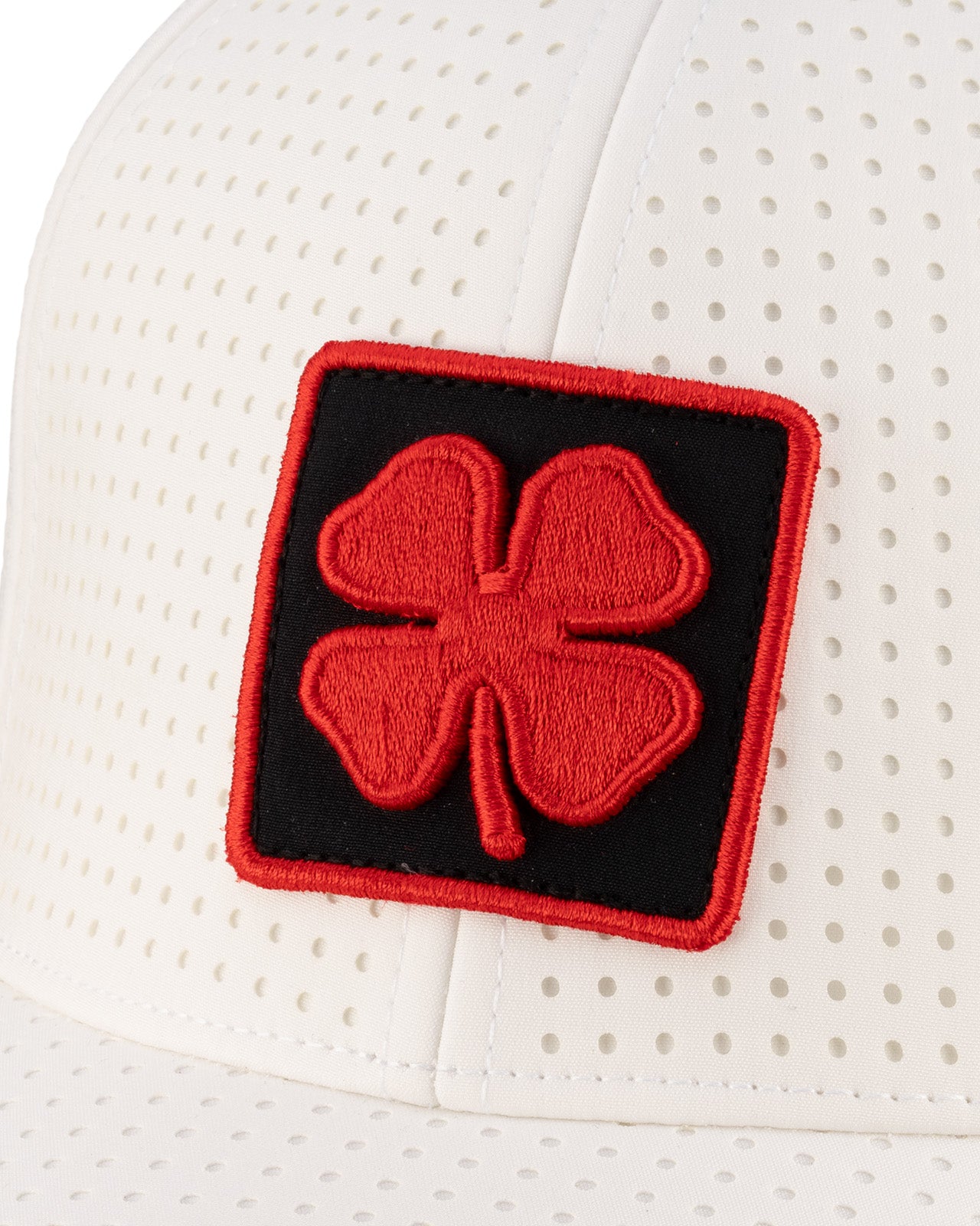 White perforated hat from Black Clover featuring University of Maryland Terrapins logo