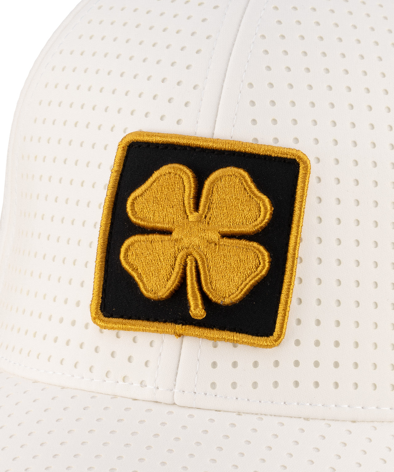 White perforated hat from Black Clover featuring University of Missouri logo