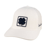 White perforated hat from Black Clover featuring University of Nevada Reno Wolfpack Logo