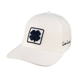 White perforated hat from Black Clover featuring University of Nevada Reno Wolfpack Logo