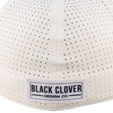 White perforated hat from Black Clover featuring University of Nevada Reno Wolfpack Logo