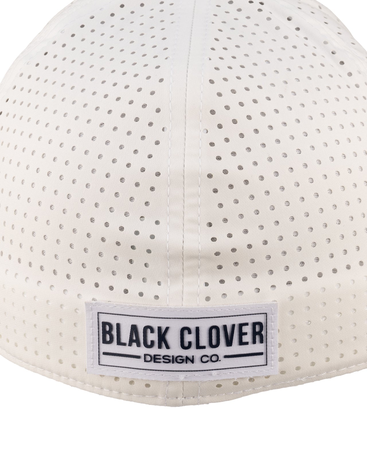 White perforated hat from Black Clover featuring University of Nevada Reno Wolfpack Logo