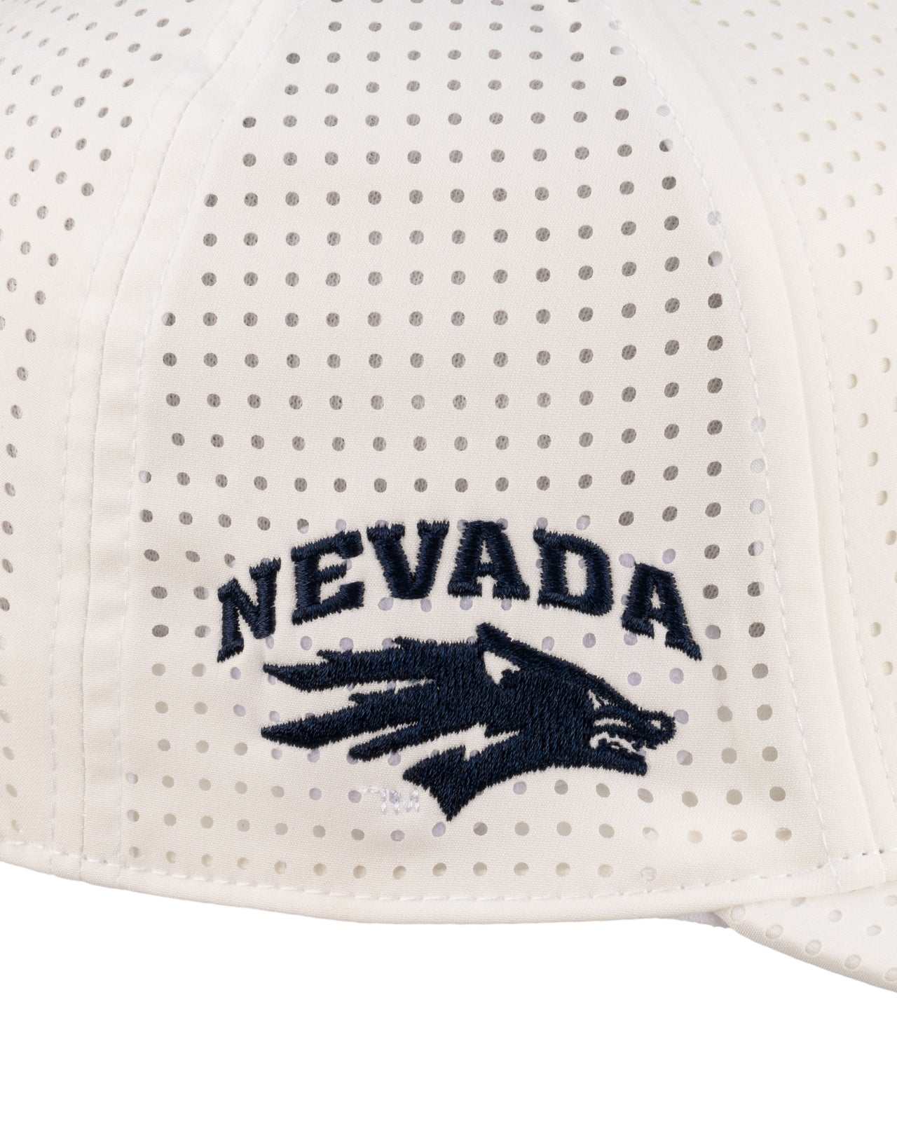 White perforated hat from Black Clover featuring University of Nevada Reno Wolfpack Logo