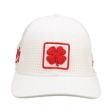 White perforated hat from Black Clover featuring New Mexico Lobos logo