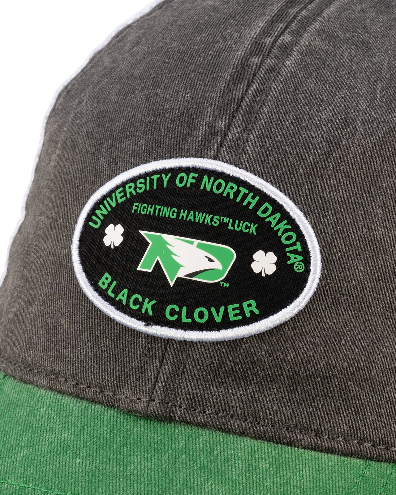 Grey and green two tone vintage style hat from Black Clover featuring North Dakota Fighting Hawks logo