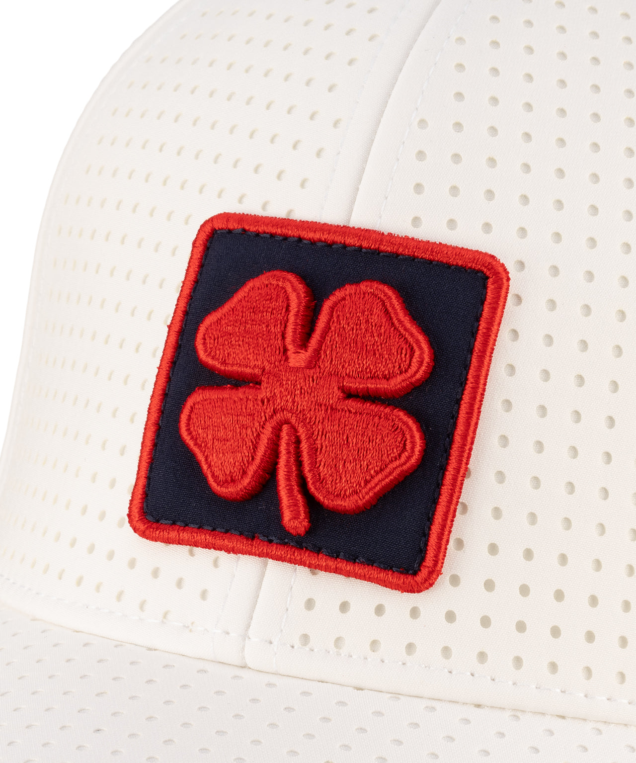 White perforated hat from Black Clover featuring Ole Miss logo