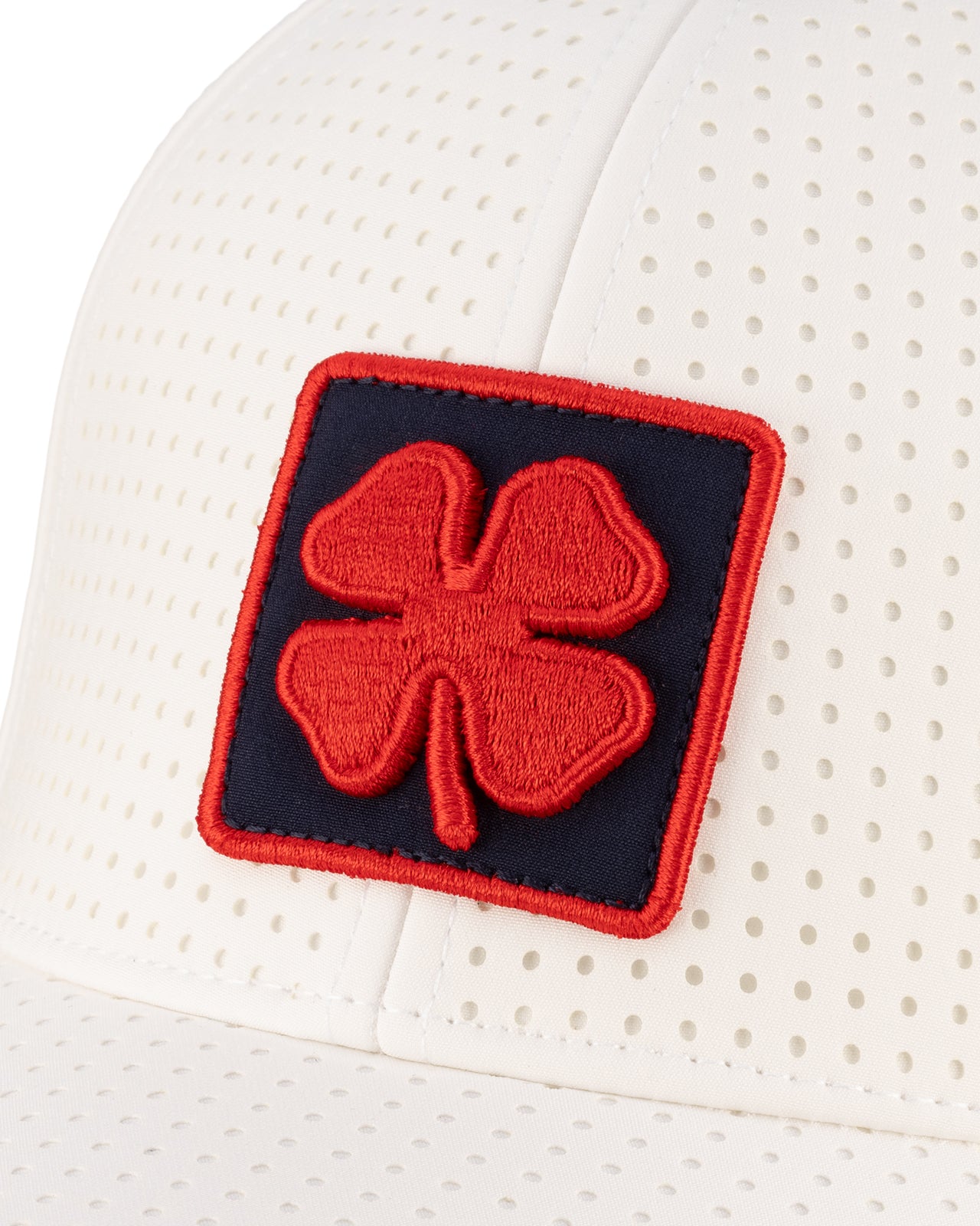 White perforated hat from Black Clover featuring Ole Miss logo