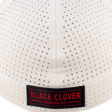 White perforated hat from Black Clover featuring Ole Miss logo