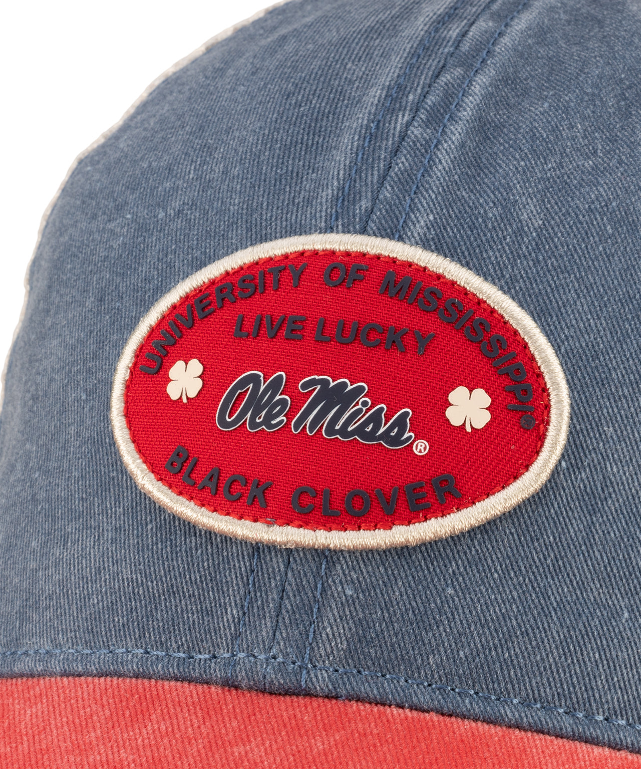 Blue and red two tone vintage style hat from Black Clover featuring Ole Miss logo